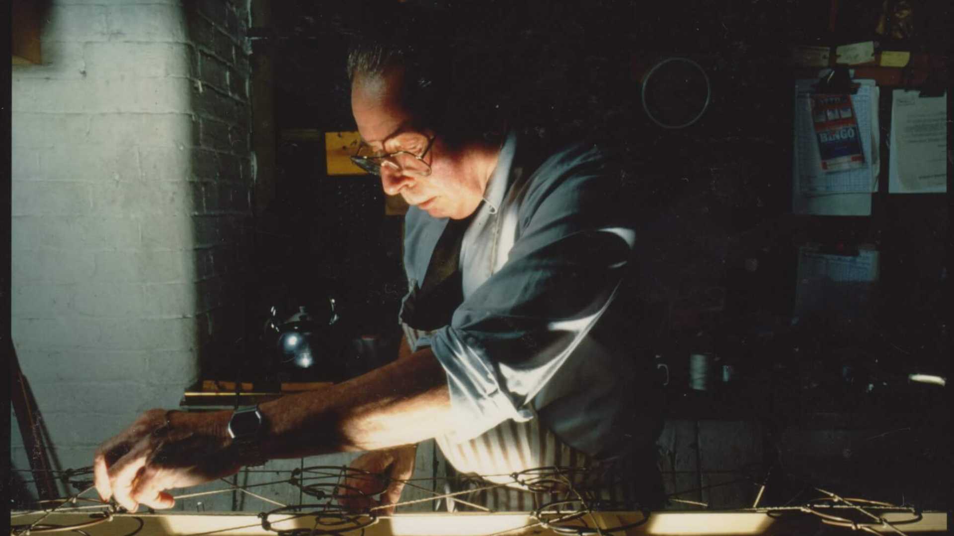 The Savoy Bedworks with craftsman working on a bed