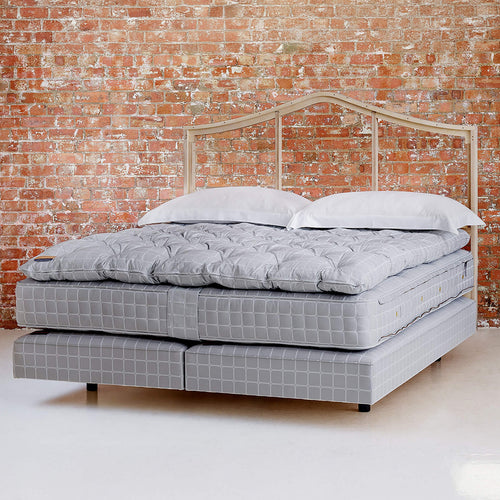 The No 3. bed set with a tripped back headboard and no bedding on to display the quality of our luxury bed frames