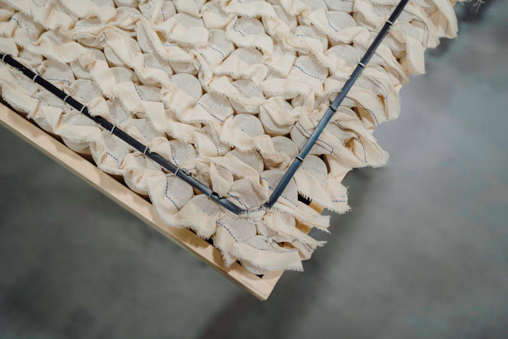 Savoir base in the making in Wales with pocket springs for the No5 the savvy bed