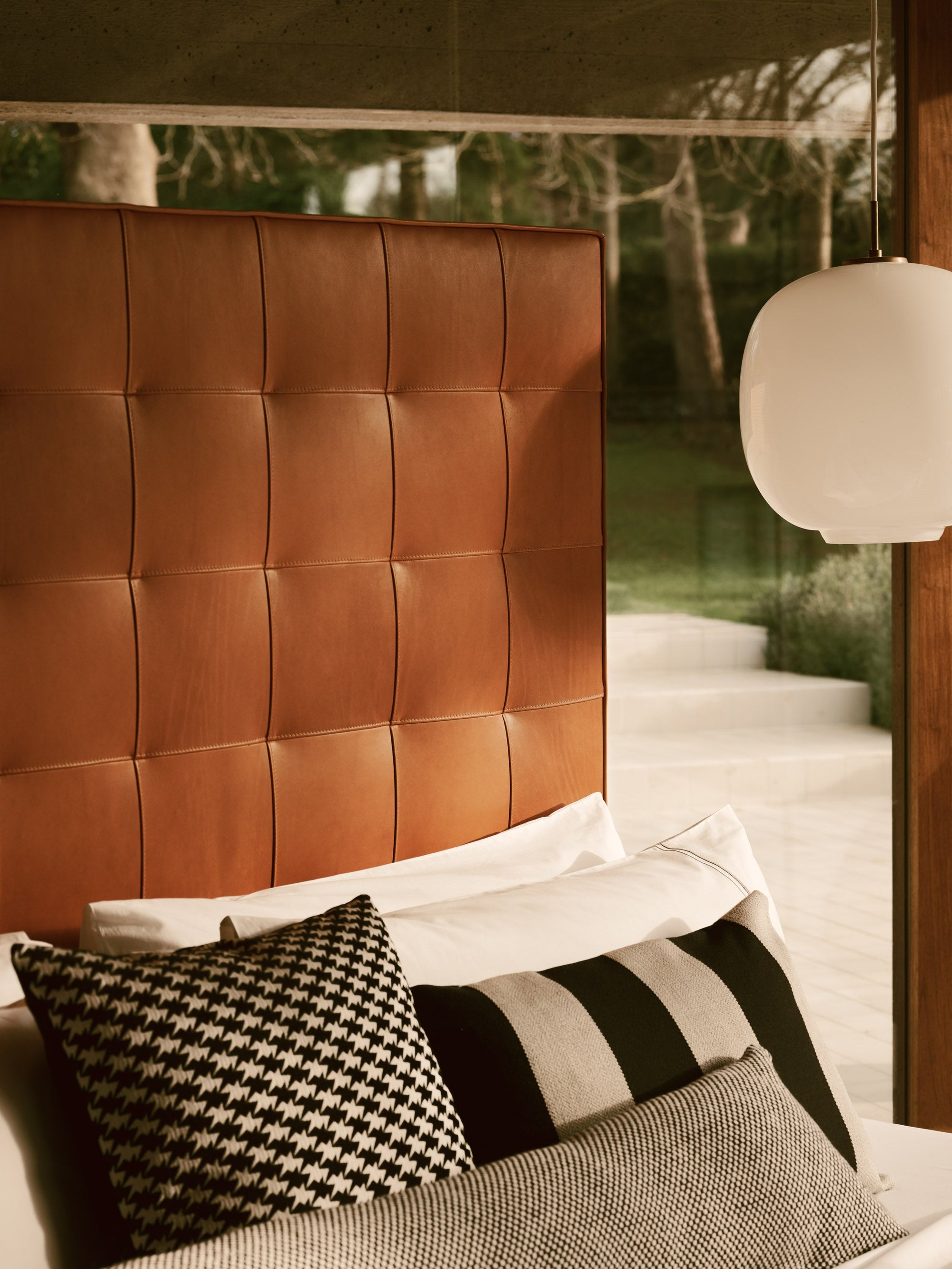 Close-up the Savoir Winston stitched panel headboard