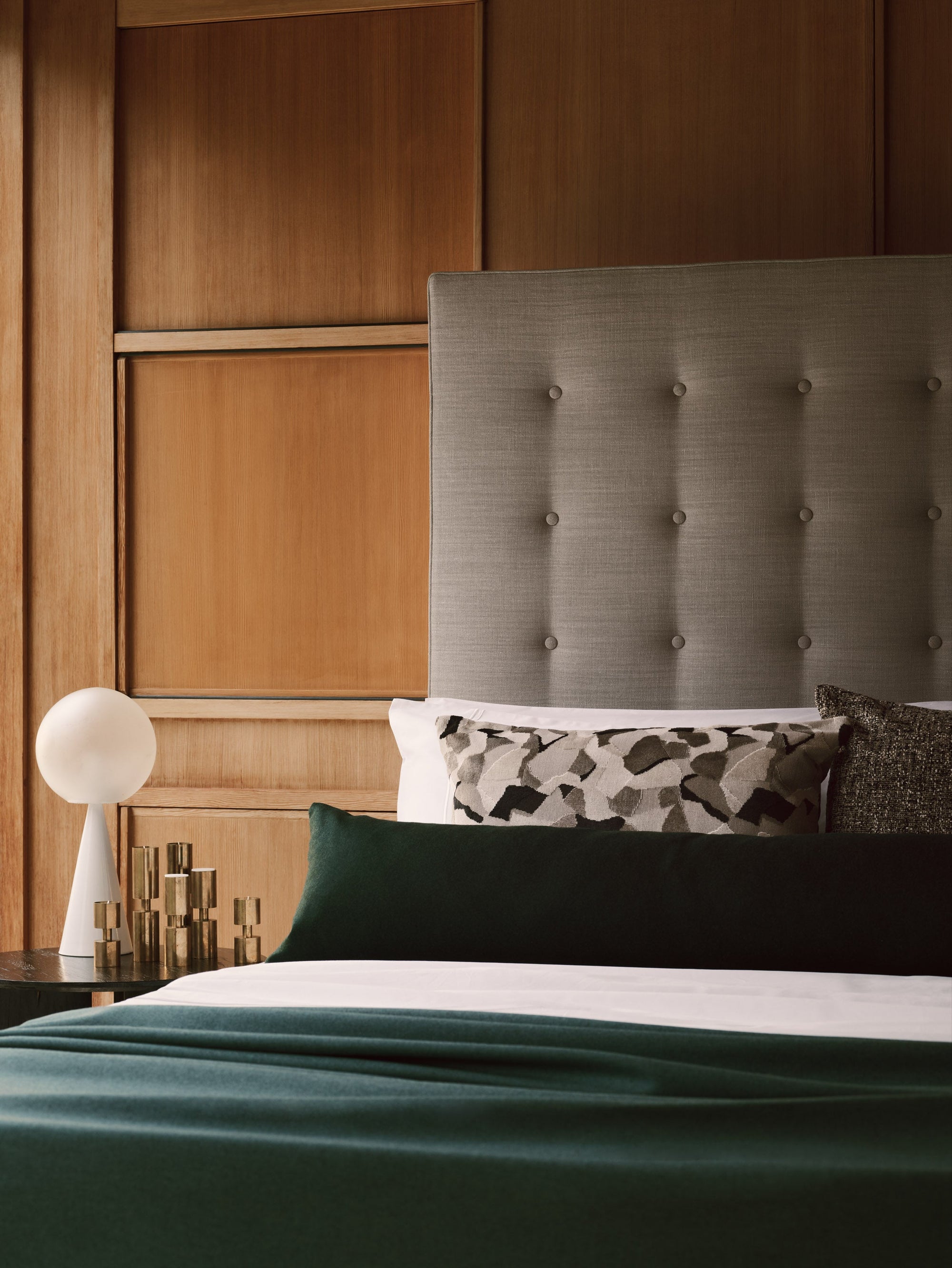 Our Holly bed with piping and covered buttons.