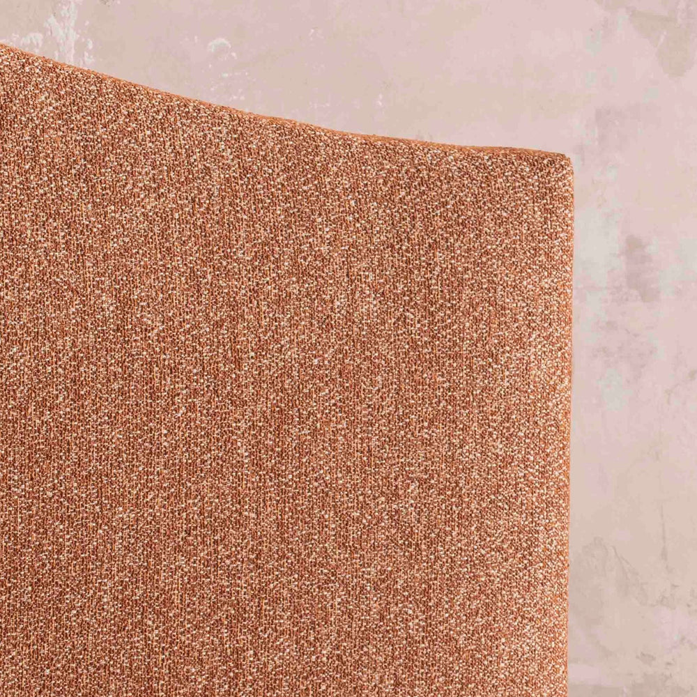 Close-up of the Savoir Alex headboard orange fabric