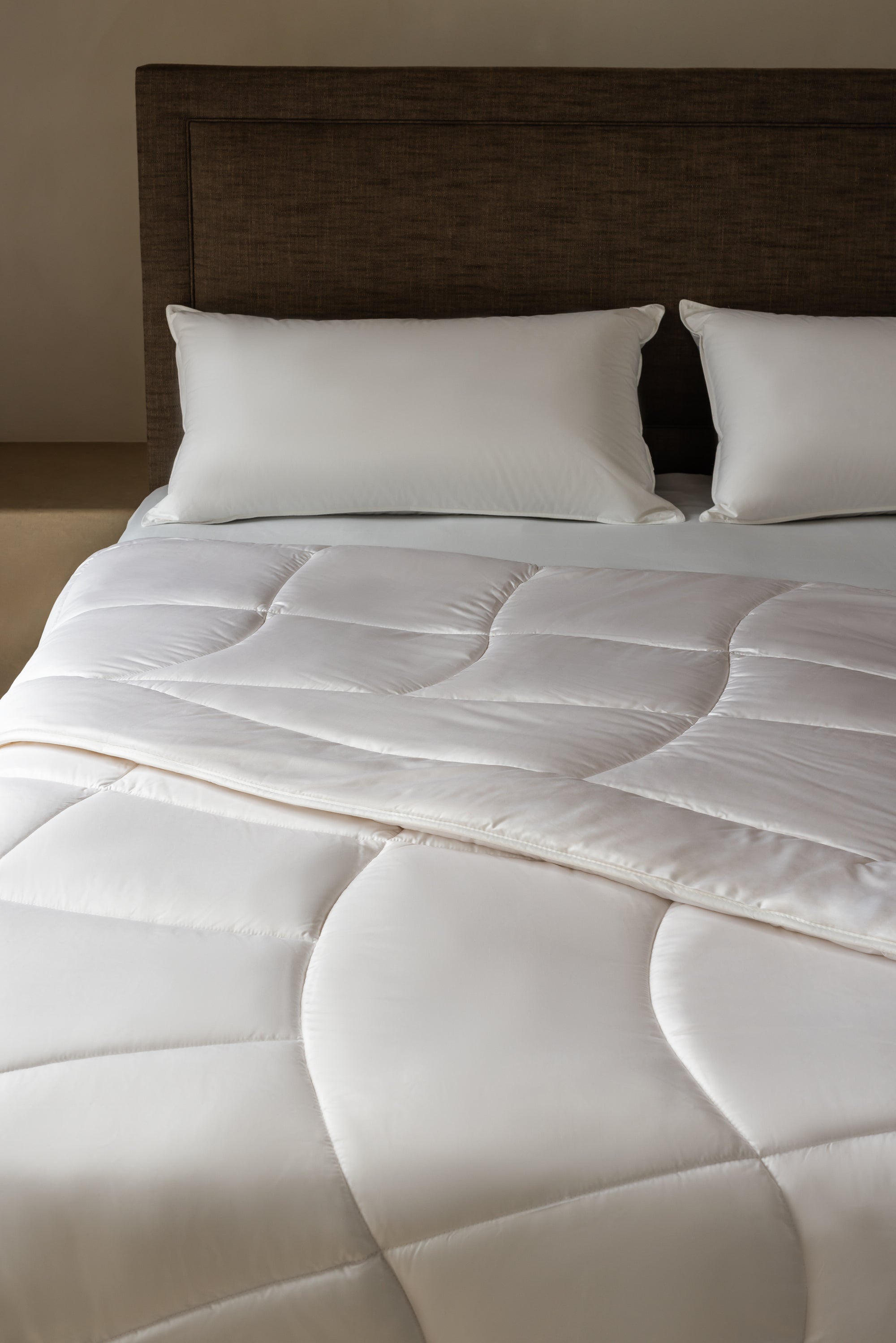 Quilted cashmere duvet on Savoir bed