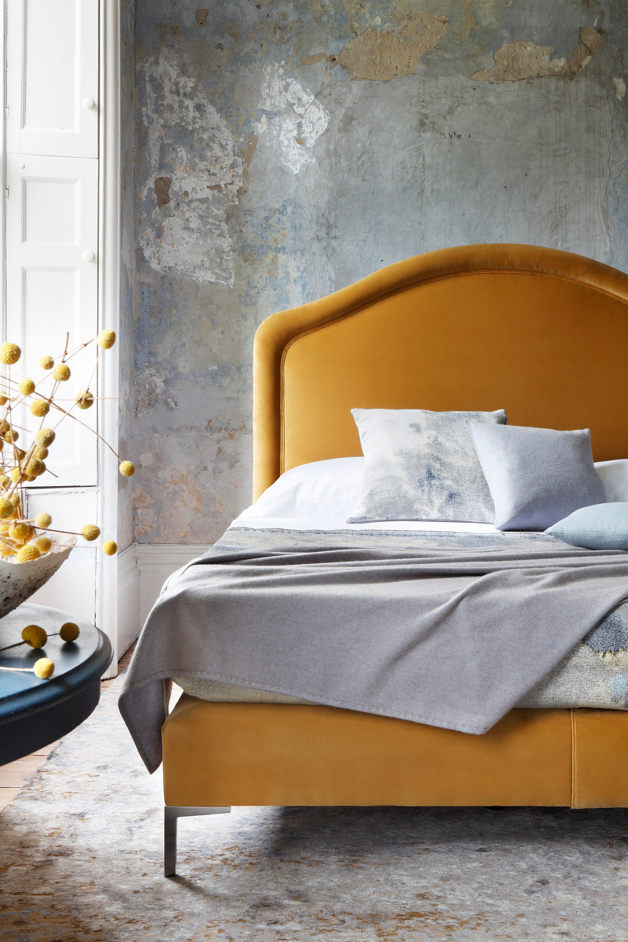 The Cassie bed with a gently curved headboard