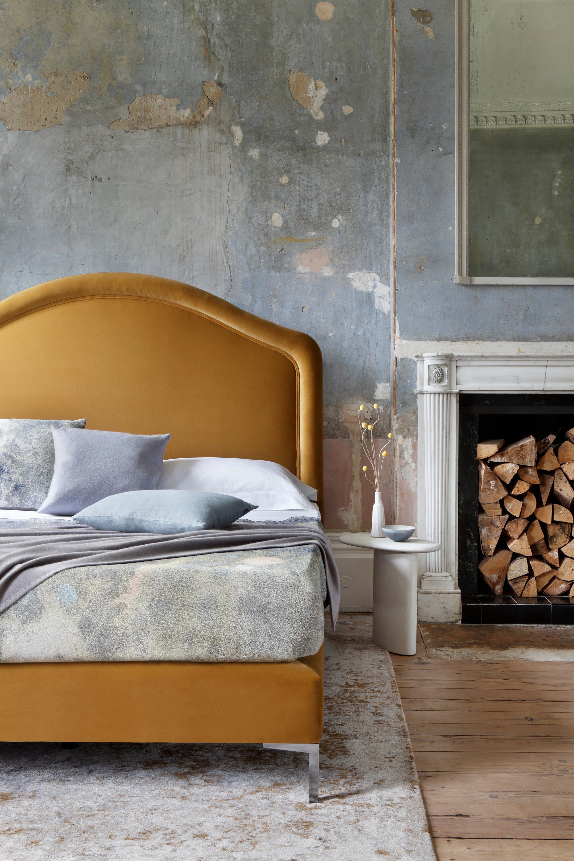 Savoir Cassie bed with a gently curved headboard and crafted with natural materials