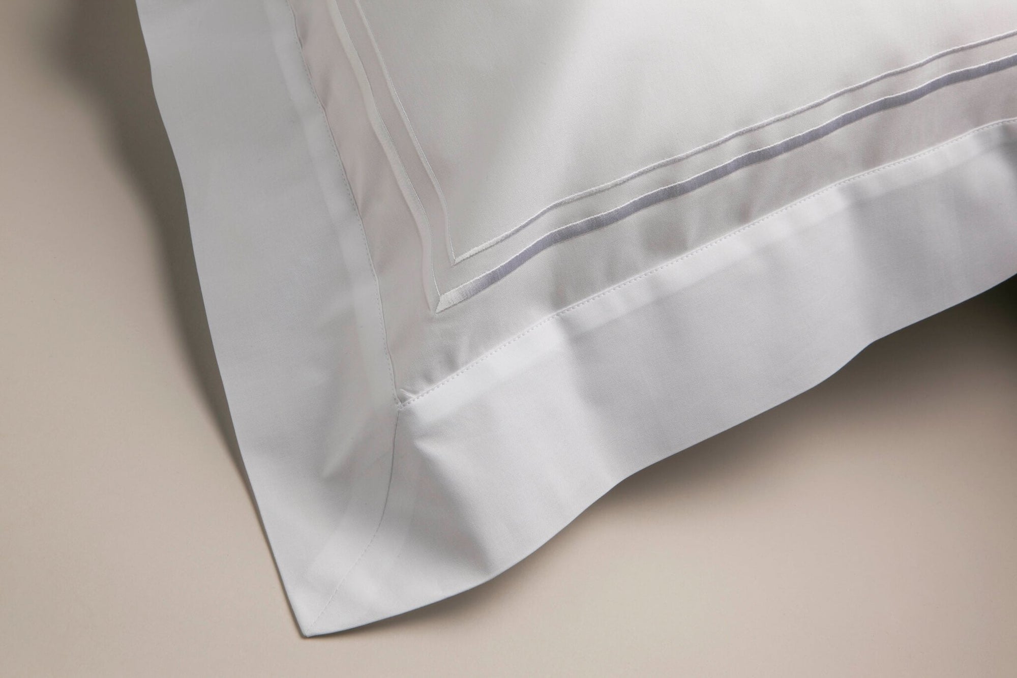White corded details on an Oxford pillowcase
