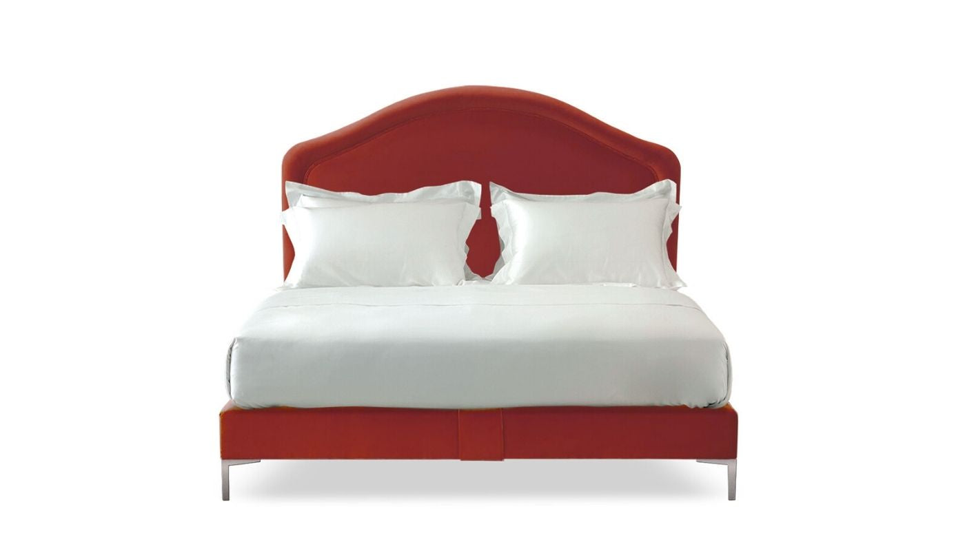 Undressed Cassie bed with a red fabric  on headboard and base, featuring cushions