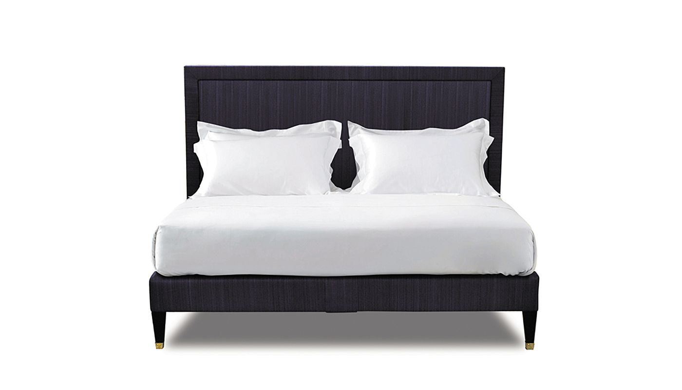 Undressed Virginia bed with a dark purple headboard and base featuring a mattress and cushions