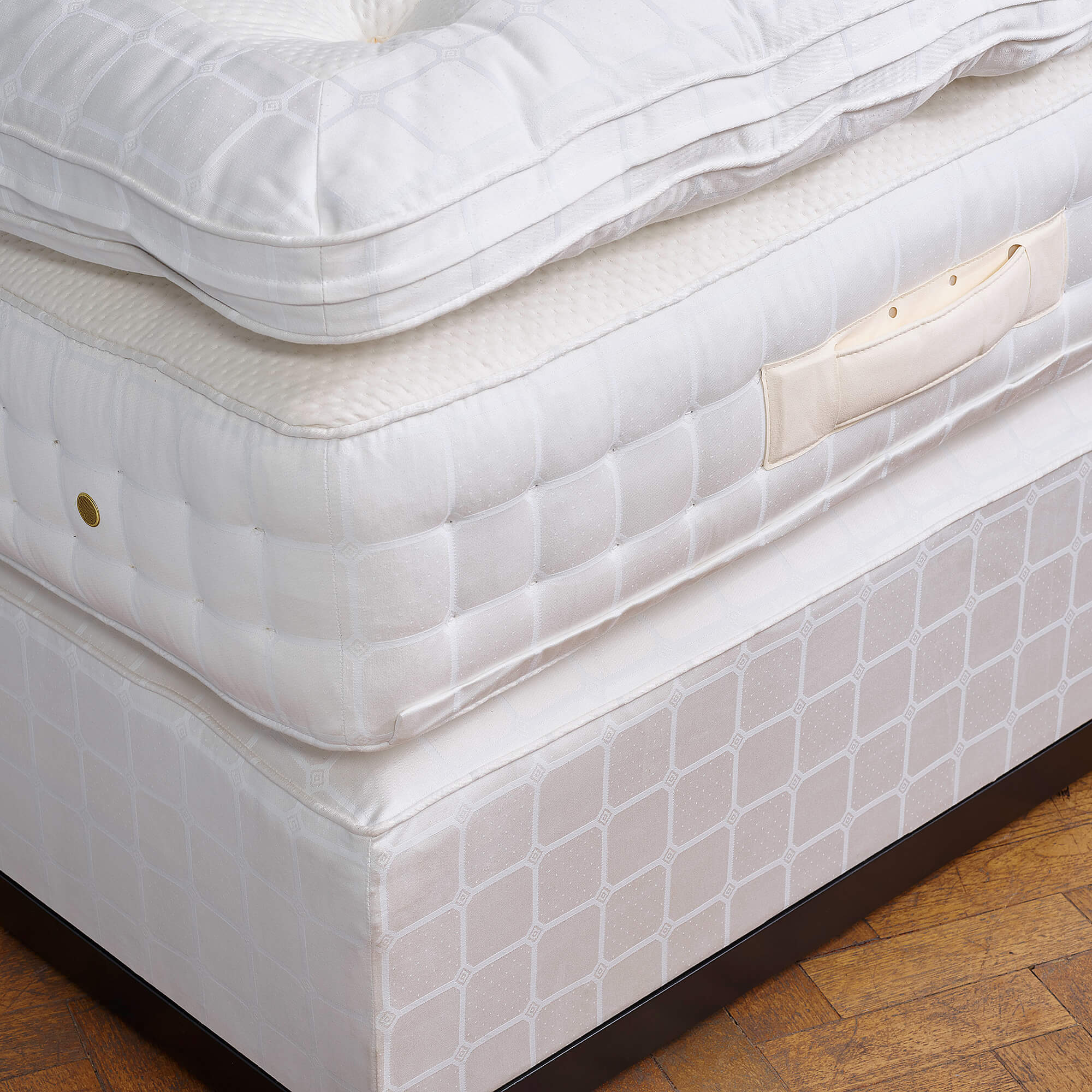 Side view and close-up of the No1 mattress and topper