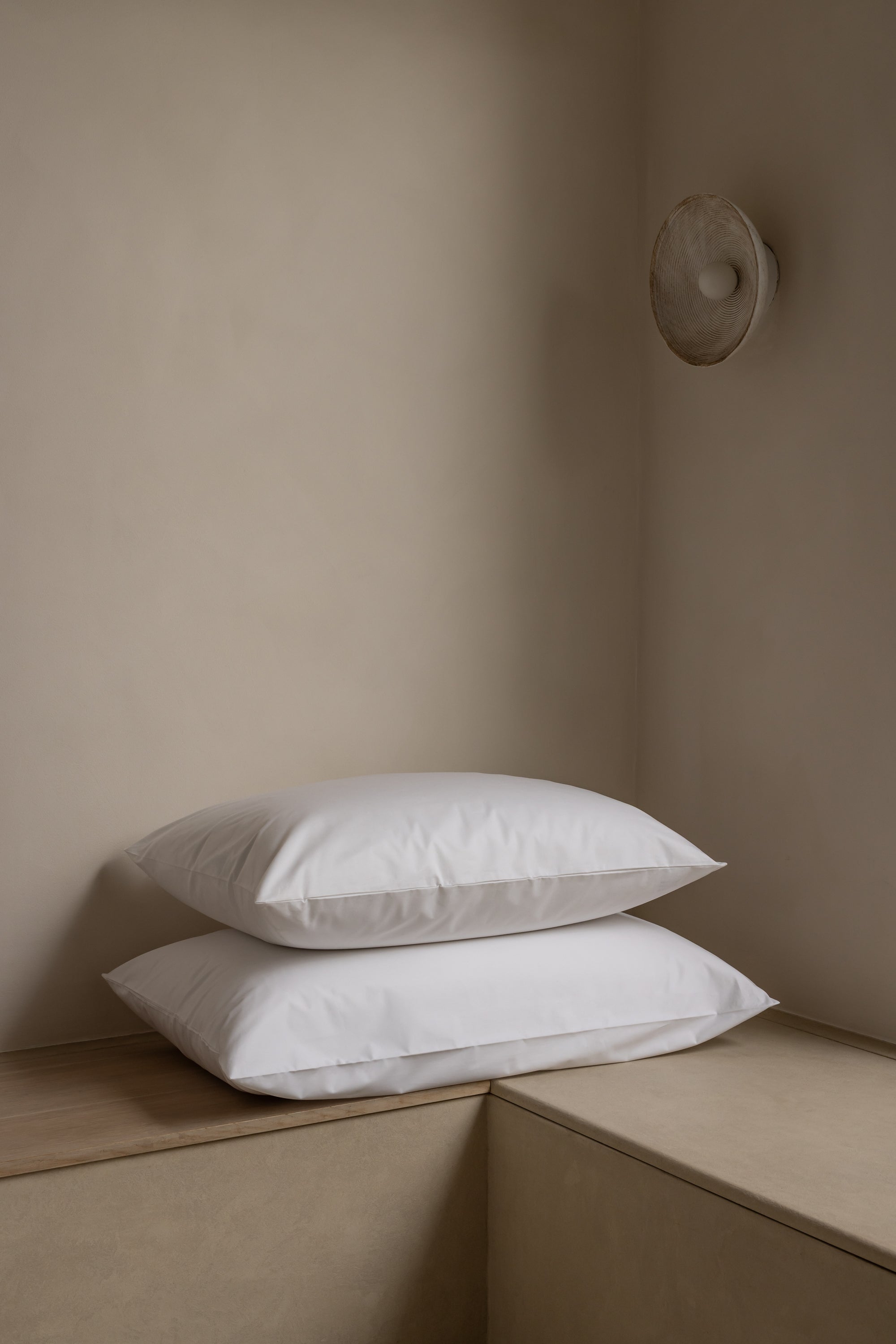 Stack of 2 pillows with pillow protectors
