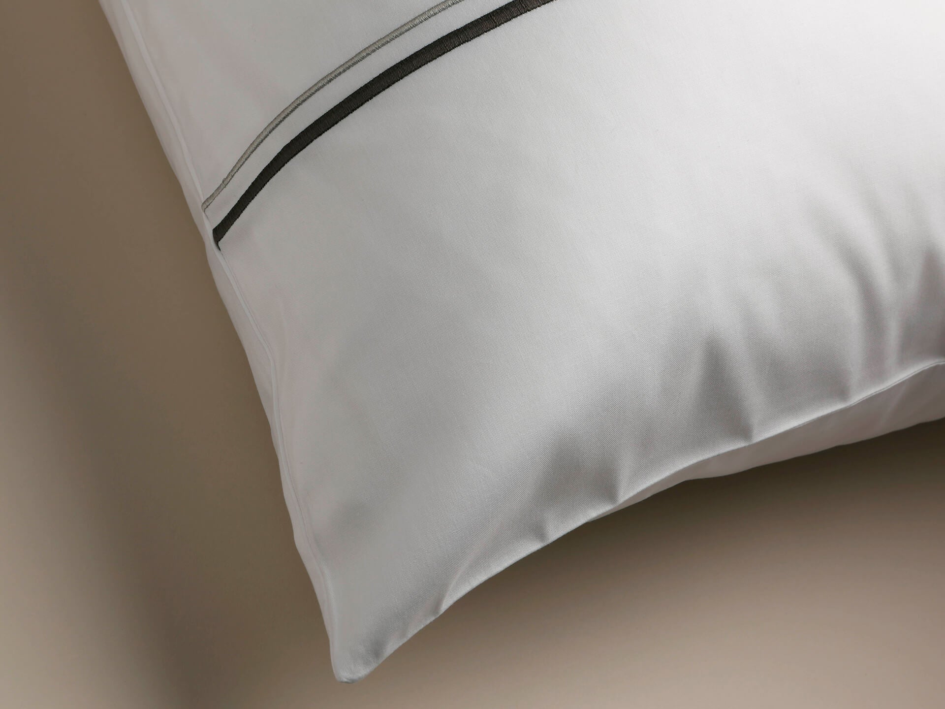 Side view of a percale pillowcase with cording details