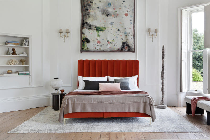 The handmade in Wales Hudson No 5 bed completely dressed and set in a room