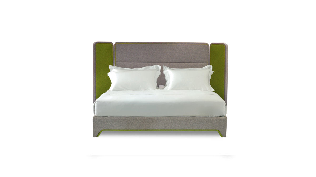 A view of the Savoir screen bed with a grey headboard and green side panels