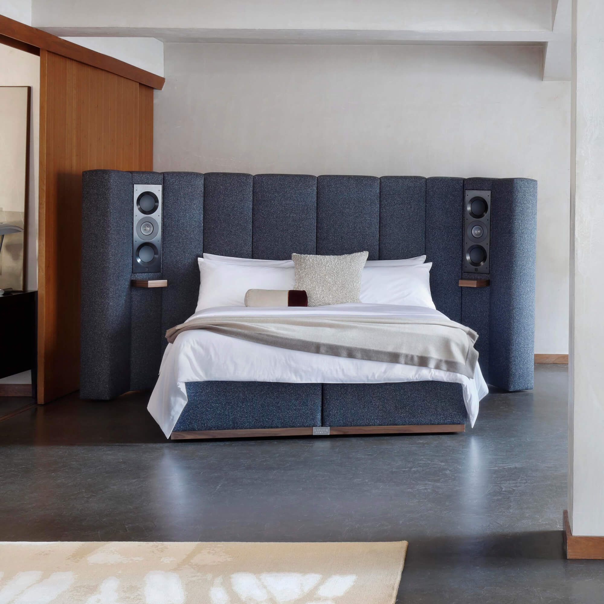Savoir Seventy Five bed completely dressed with cushions
