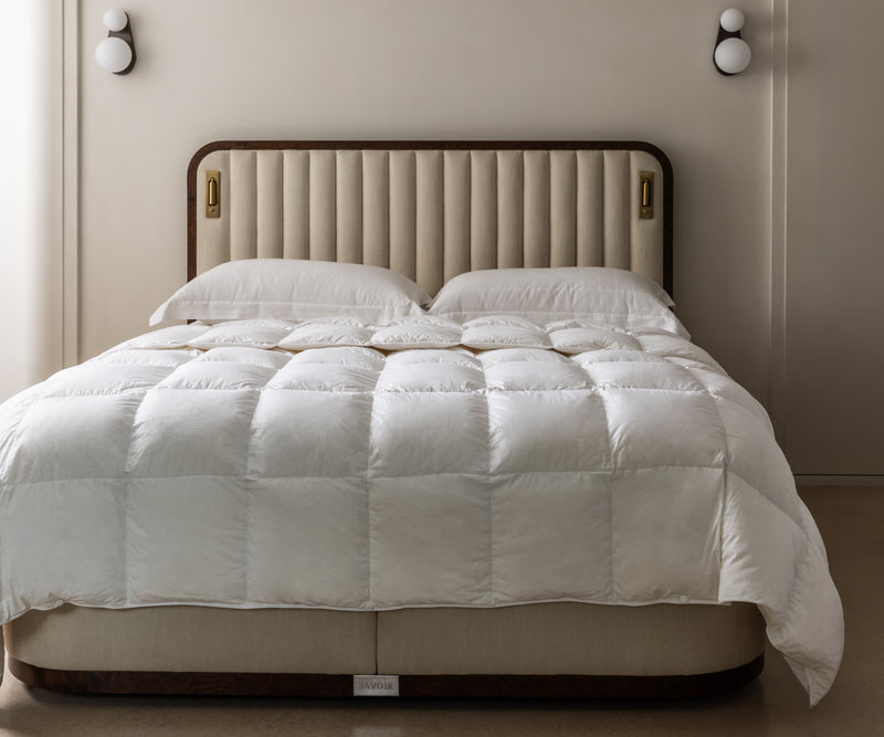 WHITE SIBERIAN GOOSE DOWN QUILTED DUVET DRAPED OVER SAVOIR LUNA BED