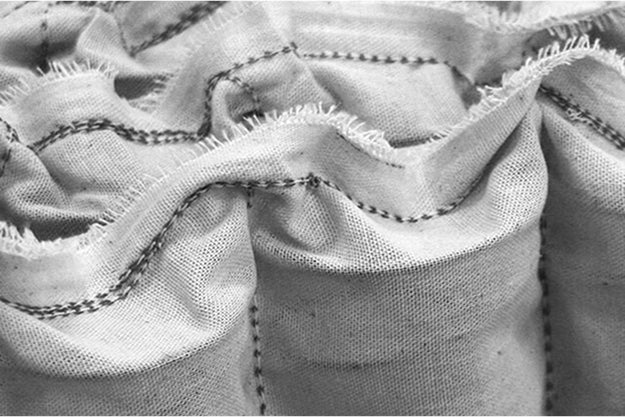 Close-up black and white image of a pocket spring